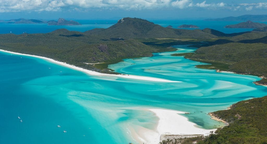 20 Mind-Blowing Places on Earth That Don't Feel Real 13 Explore Whitehaven Beach - Unreal Places on Earth