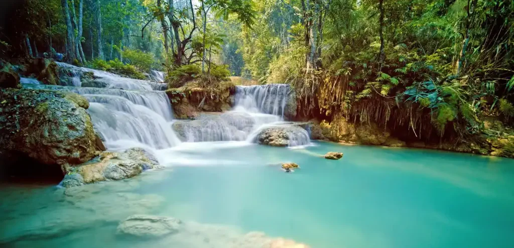 20 Mind-Blowing Places on Earth That Don't Feel Real 18 Kuang Si Falls To Visit